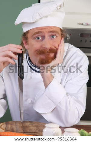 Young chef with a knife, thinking for prepare lunch