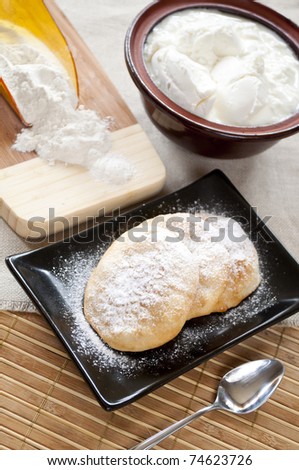 Batter fried in deep oil with sugar powder and yoghurt - Bulgarian breakfast