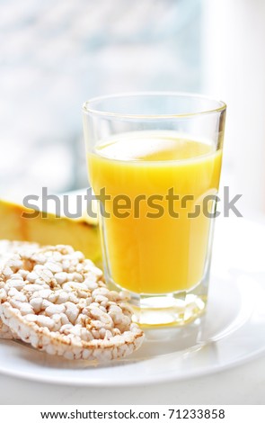 Orange juice and cereal toasts for breakfast