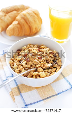 Cereal,croissants and juice for breakfast
