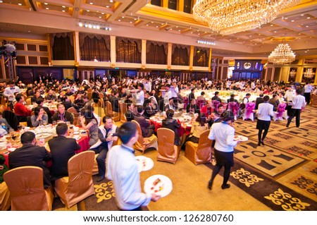 FOSHAN CITY-JANUARY 20: Foshan city hall held to celebrate Chinese New Year dinner at the hotel in 2013, more than 1000 of the industry people attended the banquet January 20, 2012 in Foshan, China