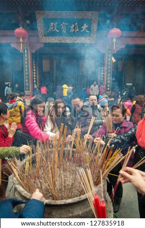 FOSHAN CITY - February 10: Chinese new year the first day of Foshan City, temple incense to worship the Buddha in February 10, 2012 in Foshan, China