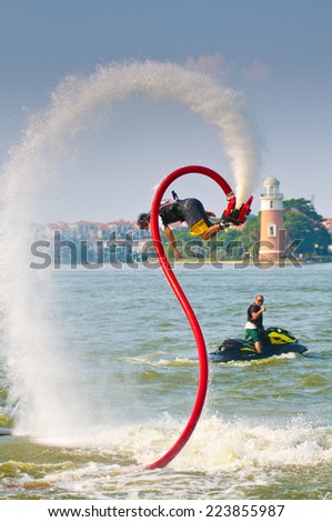 FOSHAN - Sep 29:In order to celebrate the arrival of the National Day, water stunt team in foshan lake show, great reversal movement attracted thousands of people watched Sep 29, 2014 in Foshan, China