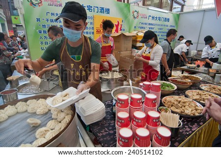 FOSHAN - Oct 25: agricultural products display and sale in Oriental plaza, 200 companies to participate in, the sale of health food, there are a lot of citizens to buy Oct 25, 2013 in FOSHAN, China