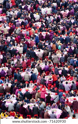 FOSHAN CITY - FEBRUARY  3: Foshan municipal government organized a thousand elderly people to have dinner together to celebrate the Chinese New Year.  February 3, 2010 in Foshan, China