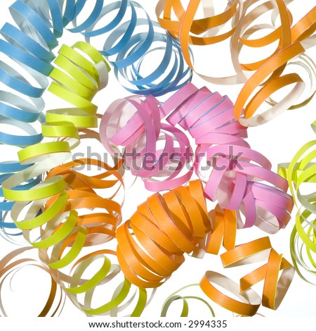 vibrant blue, green, pink and orange curly party ribbons, streamers  (isolated on white)