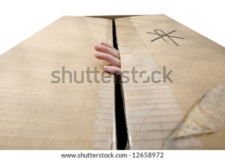 kid sitting inside of a cardboard box, closing the flaps, only showing her fingers.  (isolated on white)