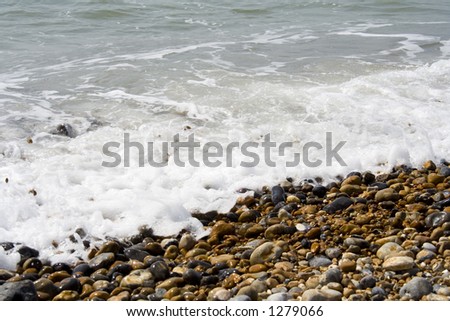 Tide coming in and rolling over a rocks