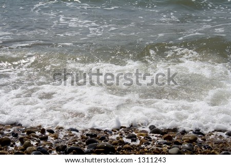 Tide coming in and rolling over a rocks