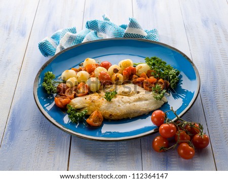 cod with onions and tomatoes sauce
