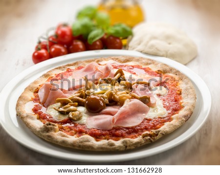pizza with ham and mushroom, selective focus