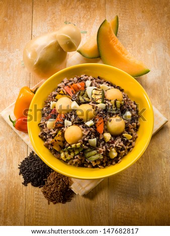 cold mixed rice salad with grilled vegetables melon and cheese