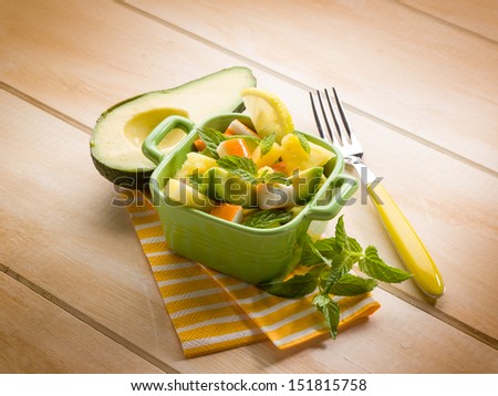 salad with avocado surimi and pineapple