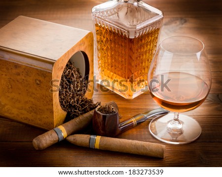 pipe tobacco cuban cigar and liquor