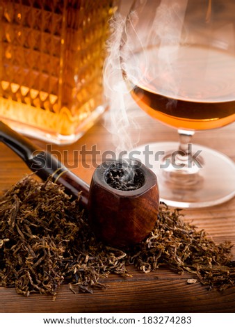 smoking pipe, tobacco  and liquor