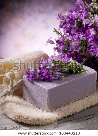 natural flower soap with scrub sponge spa concept