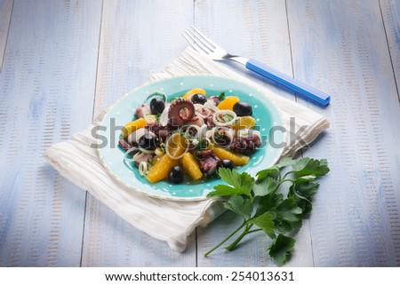 octopus salad with sliced orange