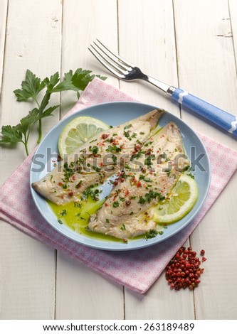 fish fillet with pink pepper and lemon sauce