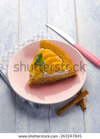 cake with peach and whipped cream