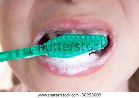 child teeth washing close up