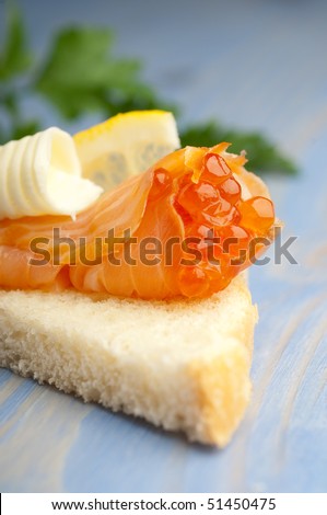 salmon eggs on sliced smoked salmon over toast