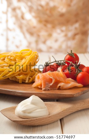 cream sauce and ingredients for salmon pasta