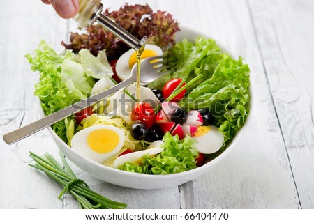 olive oil over mixed salad mixed salad
