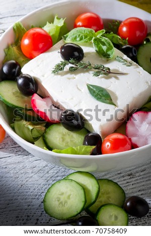 feta traditional greek cheese over greek salad