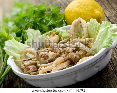 fried fish squid and shrimp with green salad