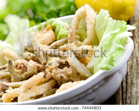fried fish squid and shrimp with green salad