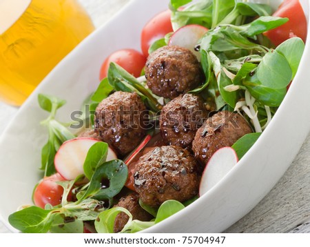 mixed salad with vegetarian meatballs slice radish and  soy sprout