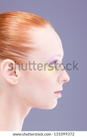 Portrait close up profile of young woman
