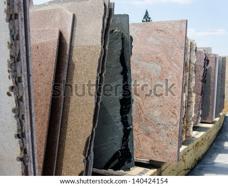 Colorful granite slabs for sale in store show room
