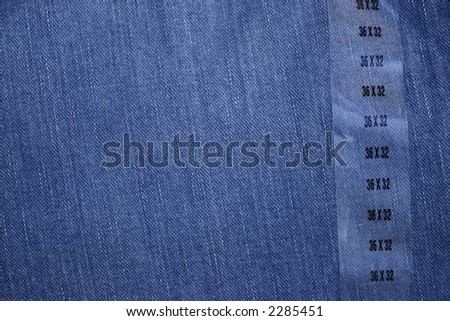 New jeans with size label. Fabric texture