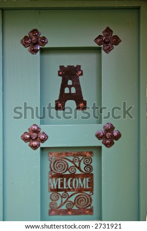 Retro painted door with rusty metal decoration and \