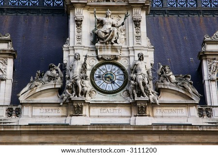Architectural details with sculptures and clock - Hotel de Ville, Paris