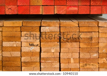Stack of wood planks on lumber yard