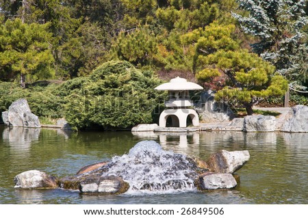 Japanese garden - landscape with pond and fountain