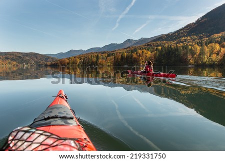 Sea kayaking on a calm lake