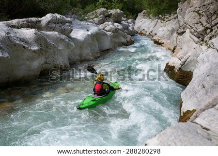 Whitewater kayaking down the rapids
