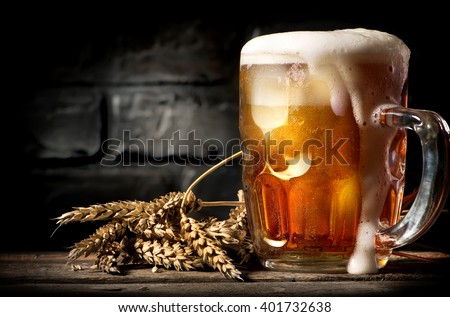 Beer near brick wall