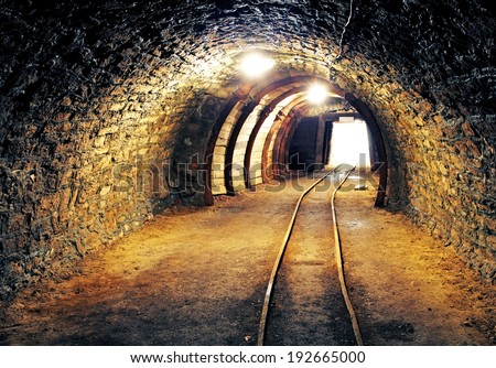 Mine underground tunnel with railroad