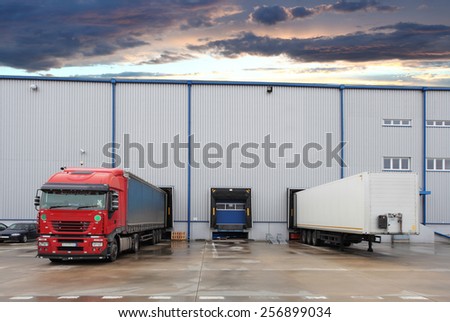 Cargo truck at warehouse building