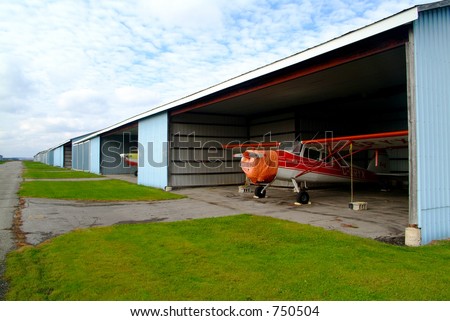A row of airplane hangars.