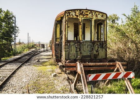 dismissed train in an abandoned rail station in Italy