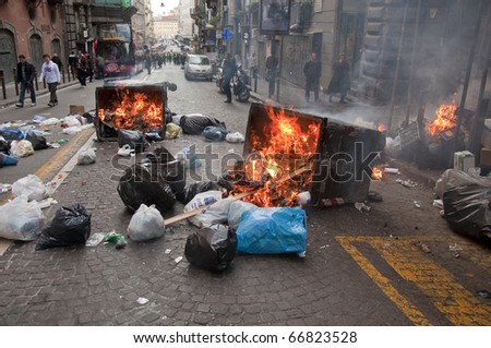 NAPLES, ITALY - DECEMBER 8: fire and violence during a strike in the city of Naples, Italy on December 8, 2010. the demonstration involved students against the Italian government