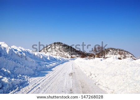 street in mountain with snow and ice