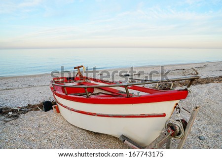old boat on the beach in winter