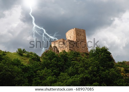 isolated tower in the forest under the lightning