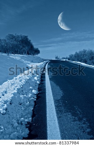 mountain road in the night with moon light